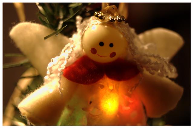 Angel with glowing heart